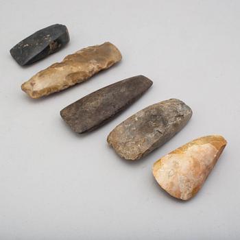 Five flint and stone axes.