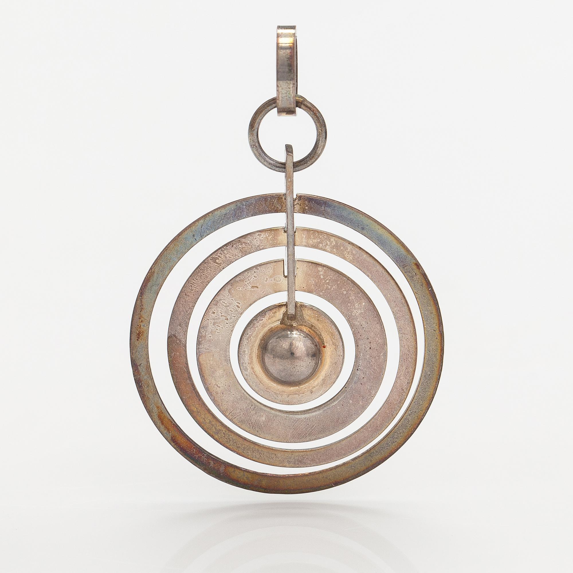 Tapio Wirkkala, A sterling silver pendand "Hopeakuu". Westerback, Helsinki 1971.