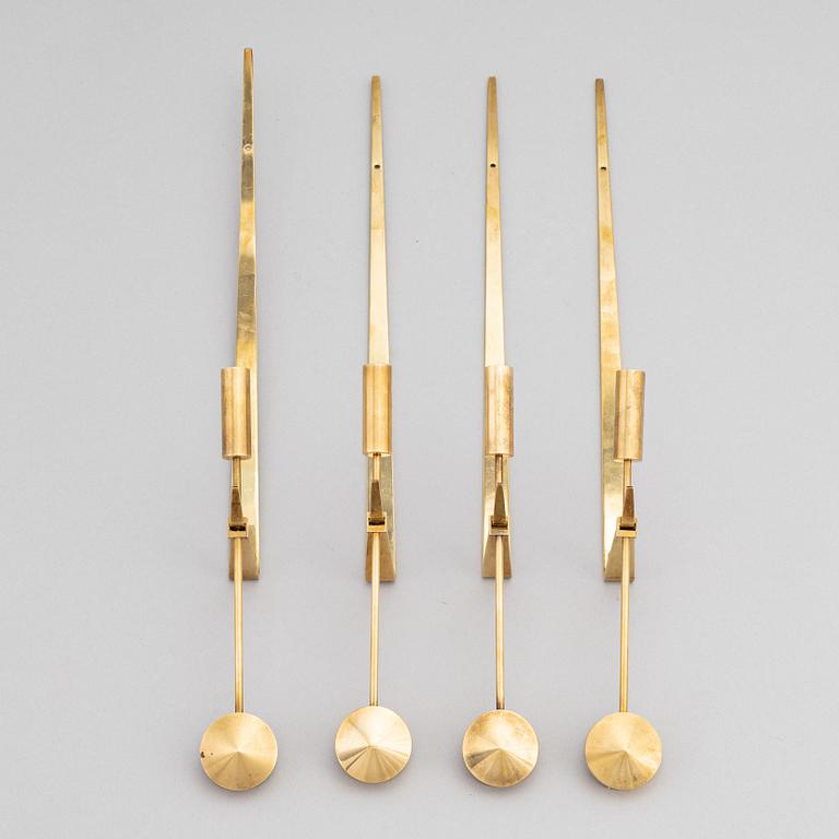 Pierre Forssell, a set of four 'Pendeln' brass wall sconces, Skultuna.