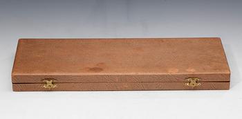 MOCKASKEDAR, 12 st, silver 916 och emalj, Tillander, Helsingfors 1951. Vikt 135 g.