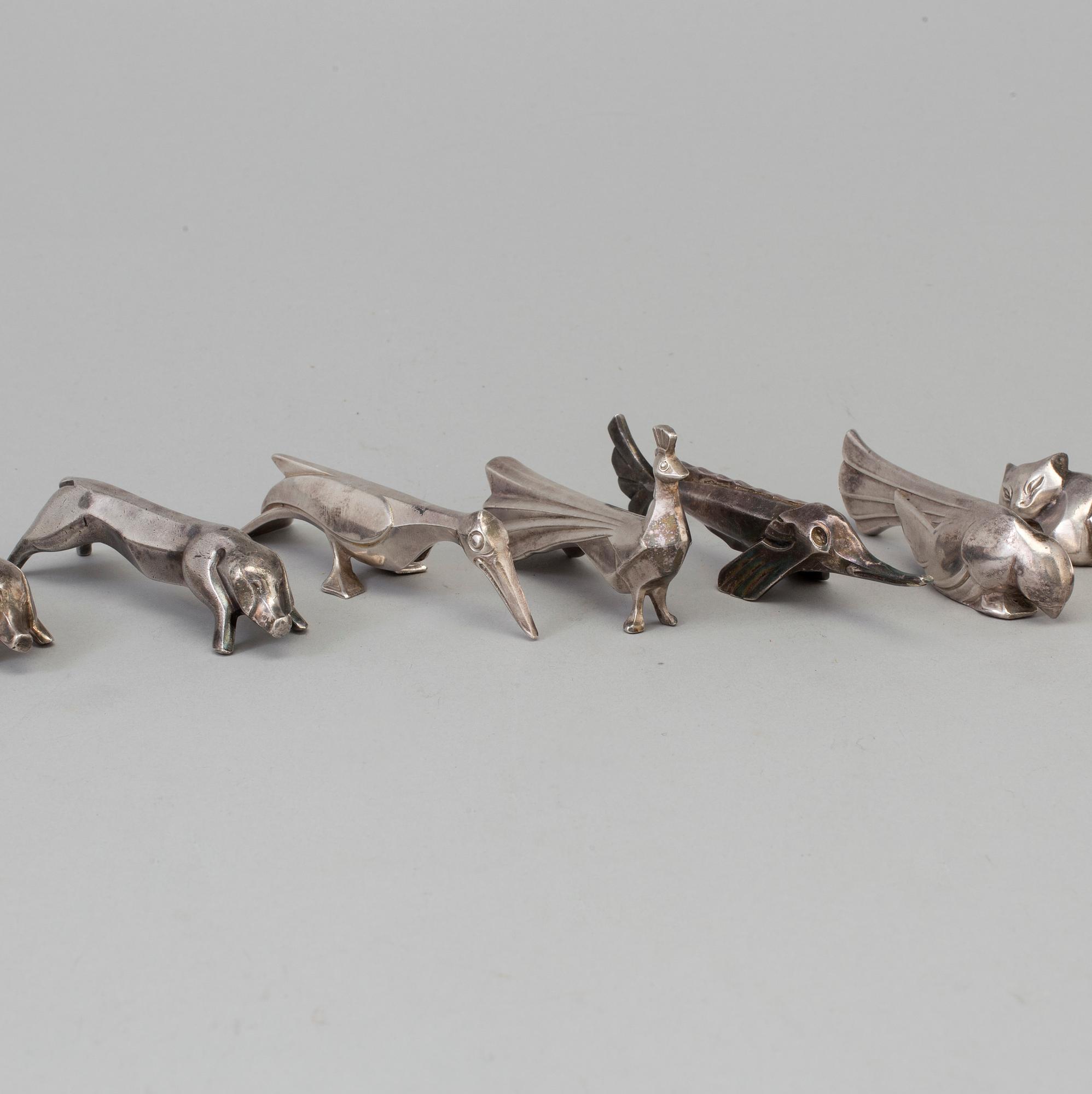 12 silver plated animal-shaped knife rests designed by Marcel Edouard Sandoz for Gallia Christofle, France.
