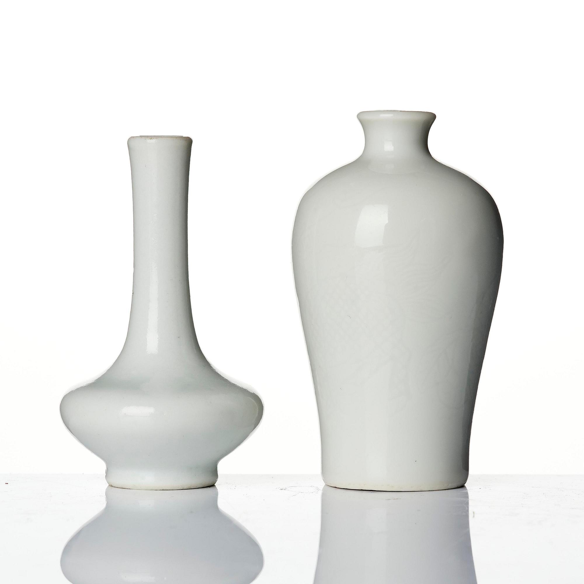 A pair of white glazed vases, Qing dynasty, 18th century.