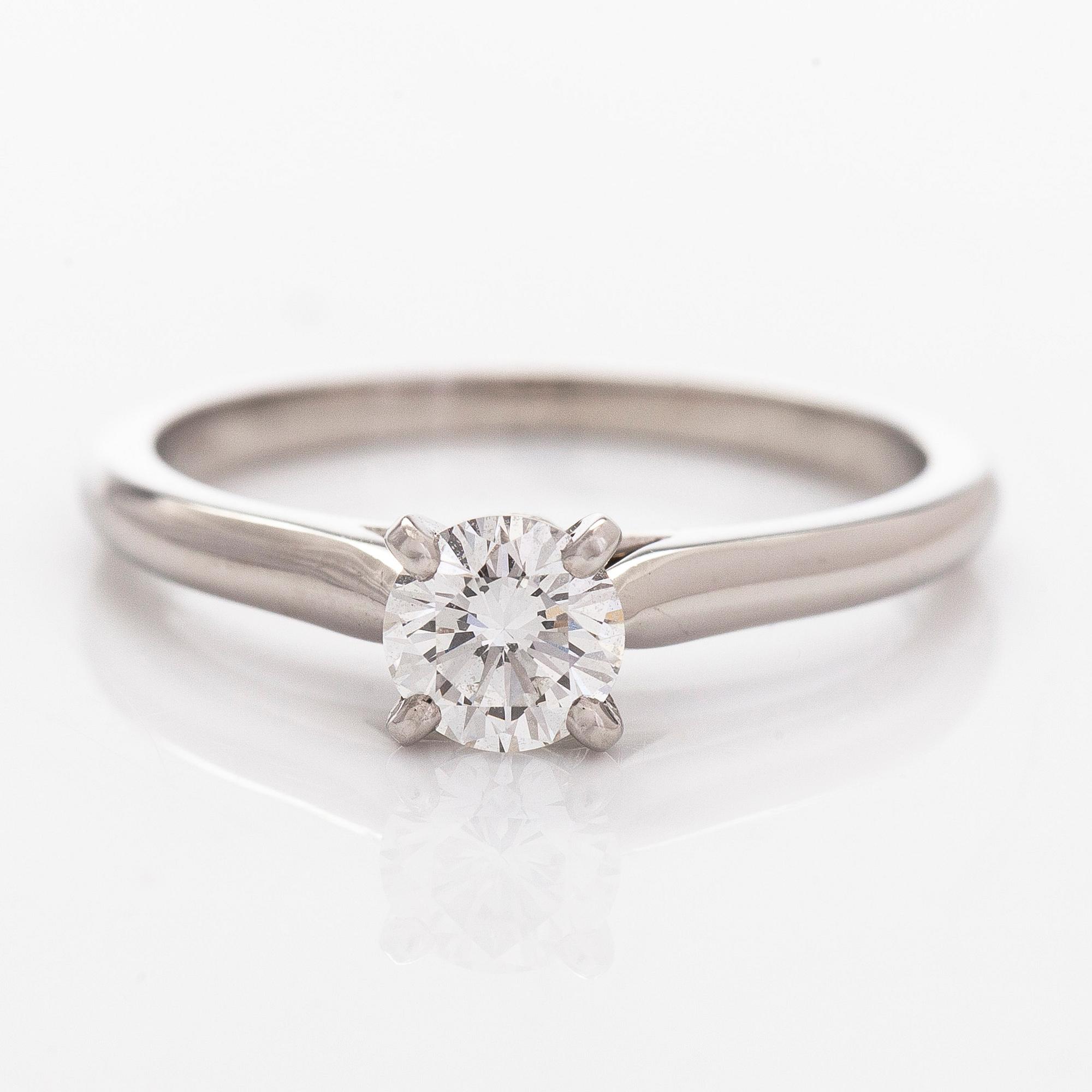 Cartier, a platinum ring, with a brilliant-cut diamond approx. 0.36 ct. With GIA dossier and certificate.