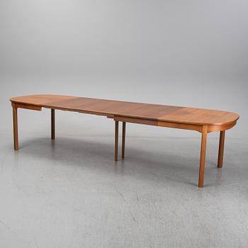 Carl Malmsten, A five-piece walnut 'Ambassadör' dining suite by Carl Malmsten.