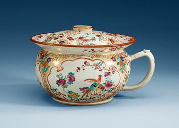 1607. A famille rose chamber pot with cover, Qing dynasty, Qianlong (1736-95).