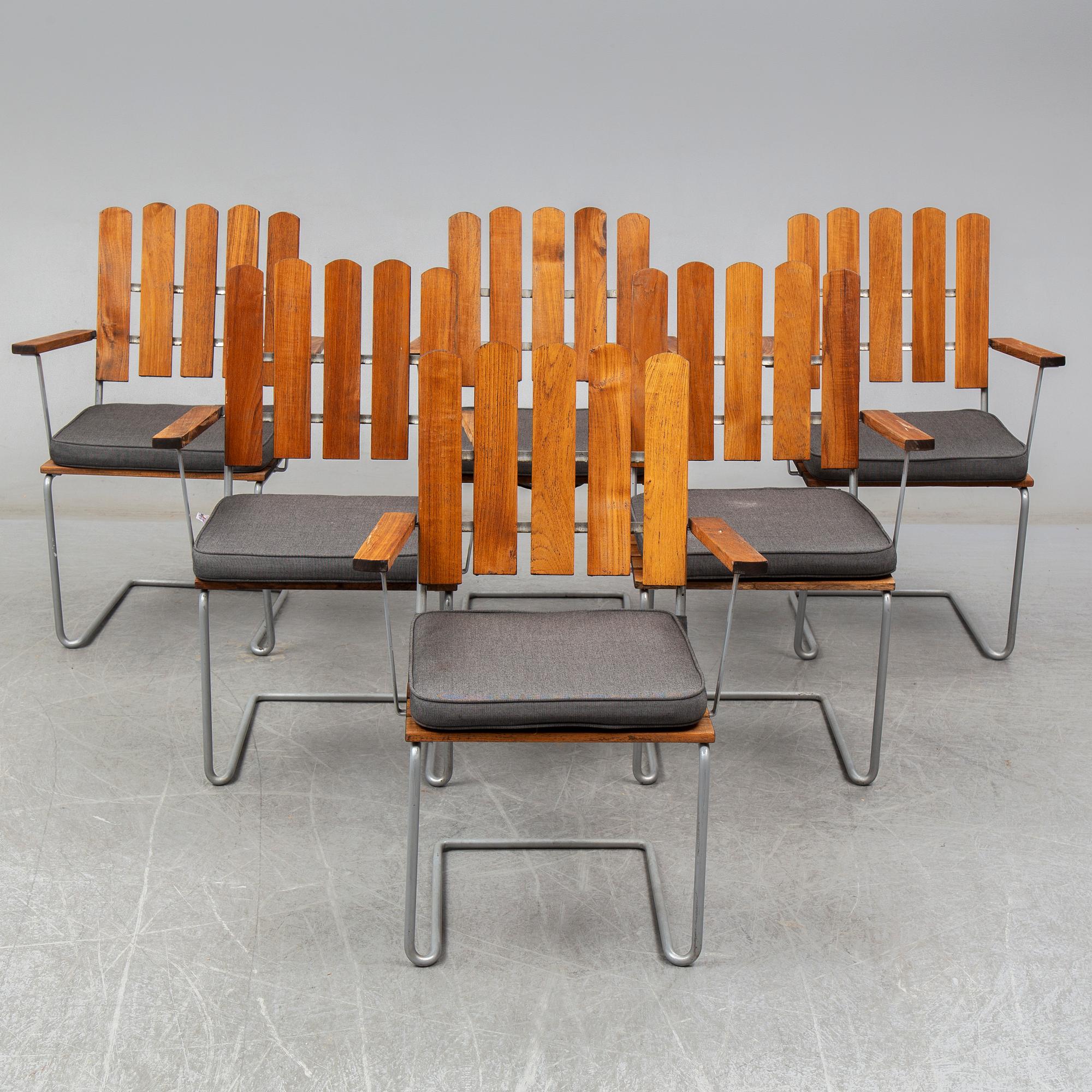 GRYTHYTTAN, a seven-piece suite of garden furniture, late 20th Century.