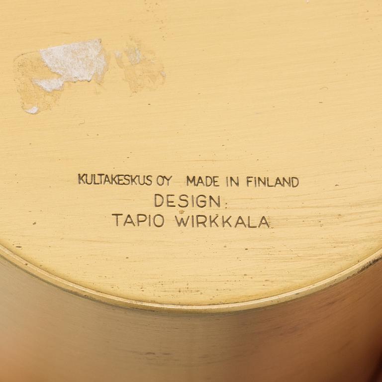 TAPIO WIRKKALA, a pair of brass candlesticks from Kultakeskus Oy, Finland.