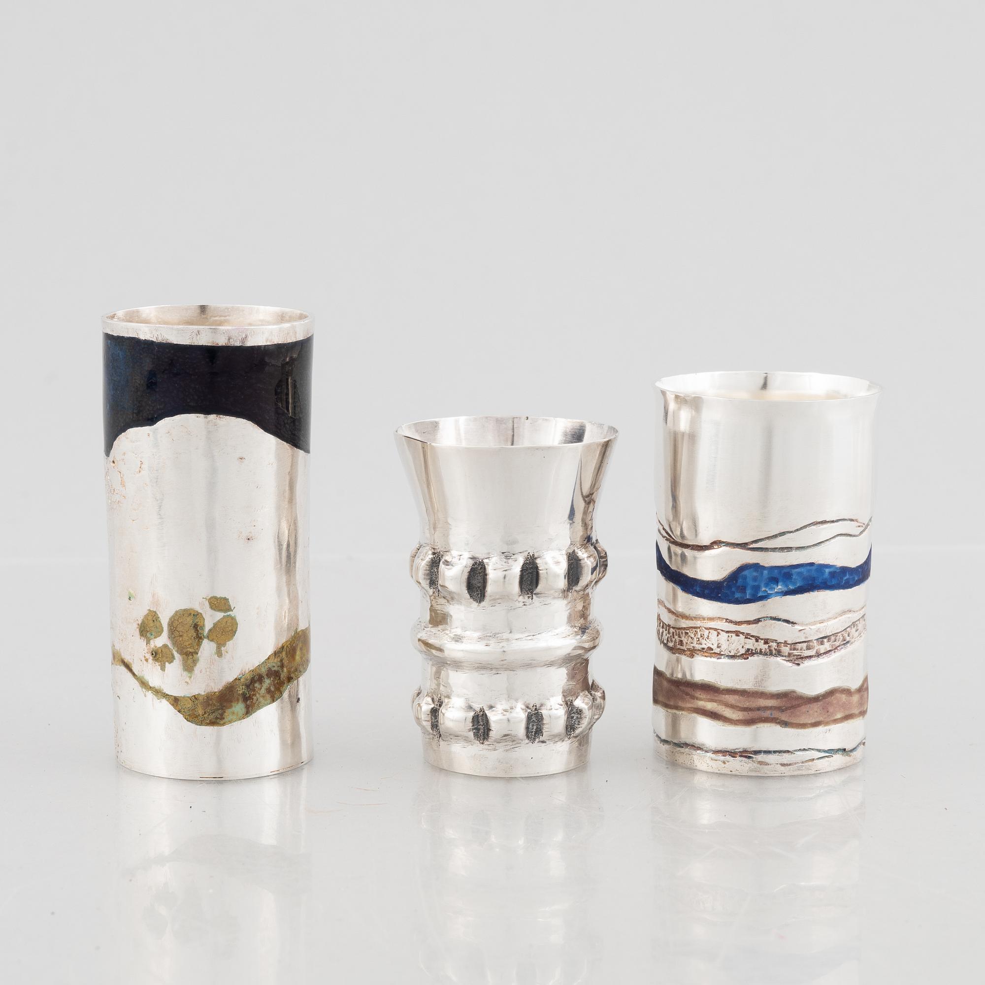 Three sterling silver miniature beakers/vases, marks of Lars Arby, Gothenburg, Sweden 1977-1982.