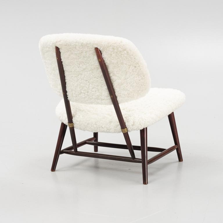 Alf Svensson, a 'TeVe', easy chair with new sheepskin upholstery, Bra Bohag, Studio Ljungs Industrier, 1950s.