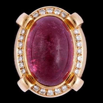 A large cabochon cut pink tourmaline and diamond ring, 0.47 cts.