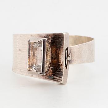 Silver and rock crystal bangle by Martin Öhman.