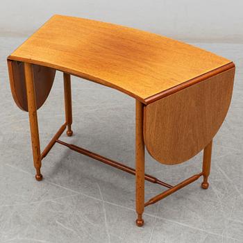 JOSEF FRANK, a model 1333 mahogany table from Firma Svenskt Tenn.