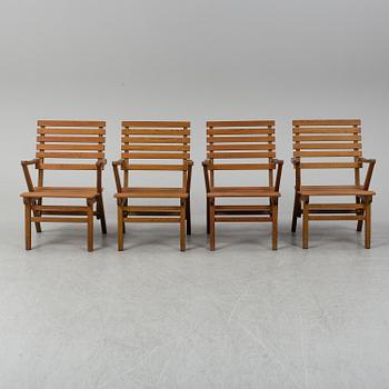 A Carl Malmsten "Bergshamra" garden table and four chairs, first half of the 20th century.