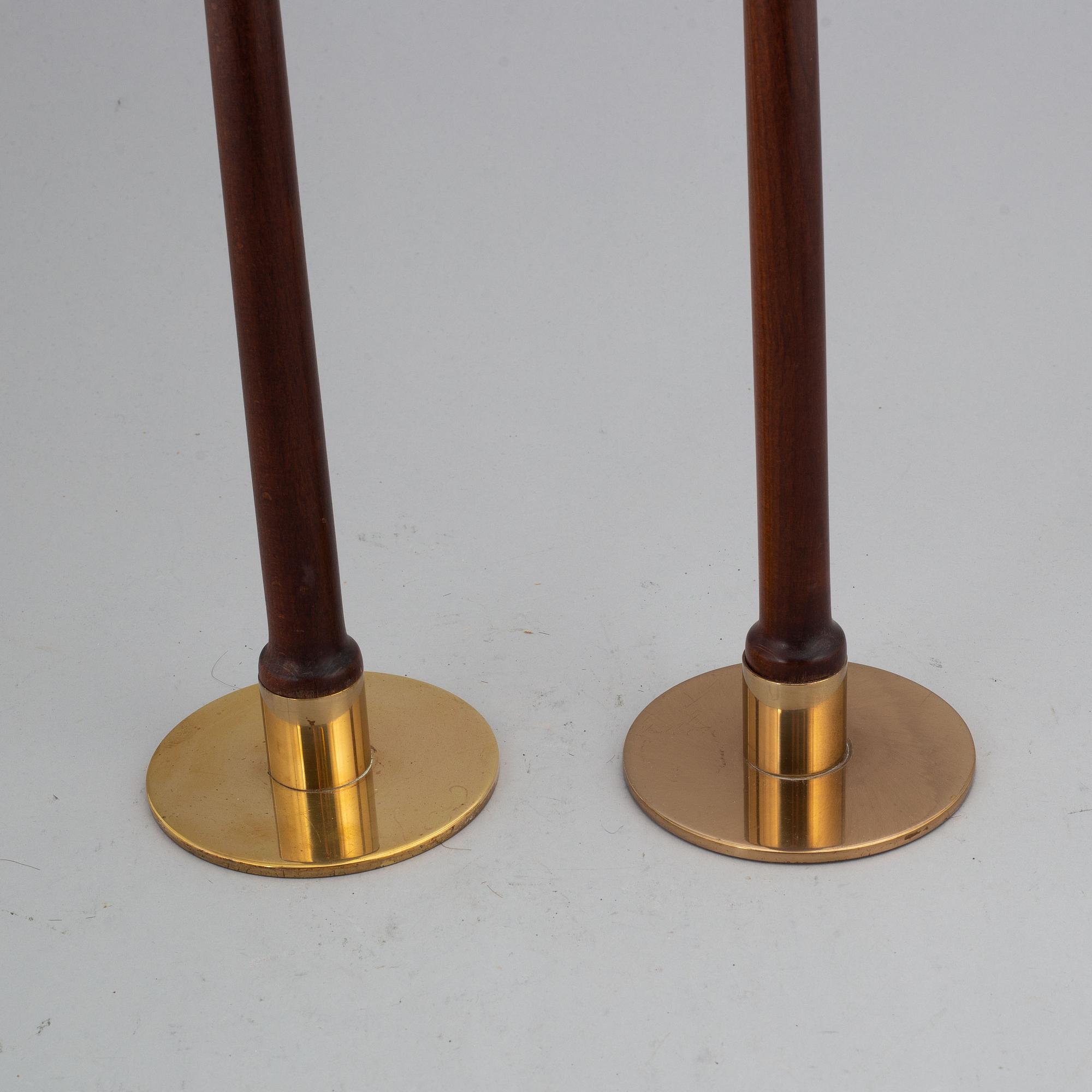 HANS-AGNE JAKOBSSON, a pair of brass and teak candle holders, Markaryd, mid 20th century.