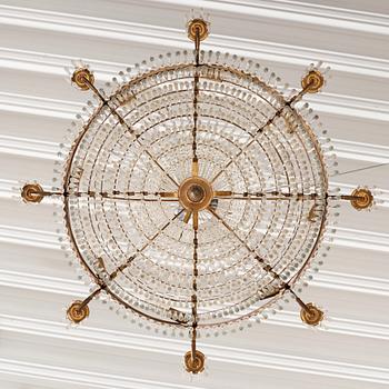 A gilt brass and cut glass nine-light Empire chandelier, first part of the 19th Century.