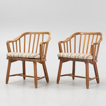 A pair of 'Hytte' pinewood armchairs, Nordiska Kompaniet, Sweden, 1940's.