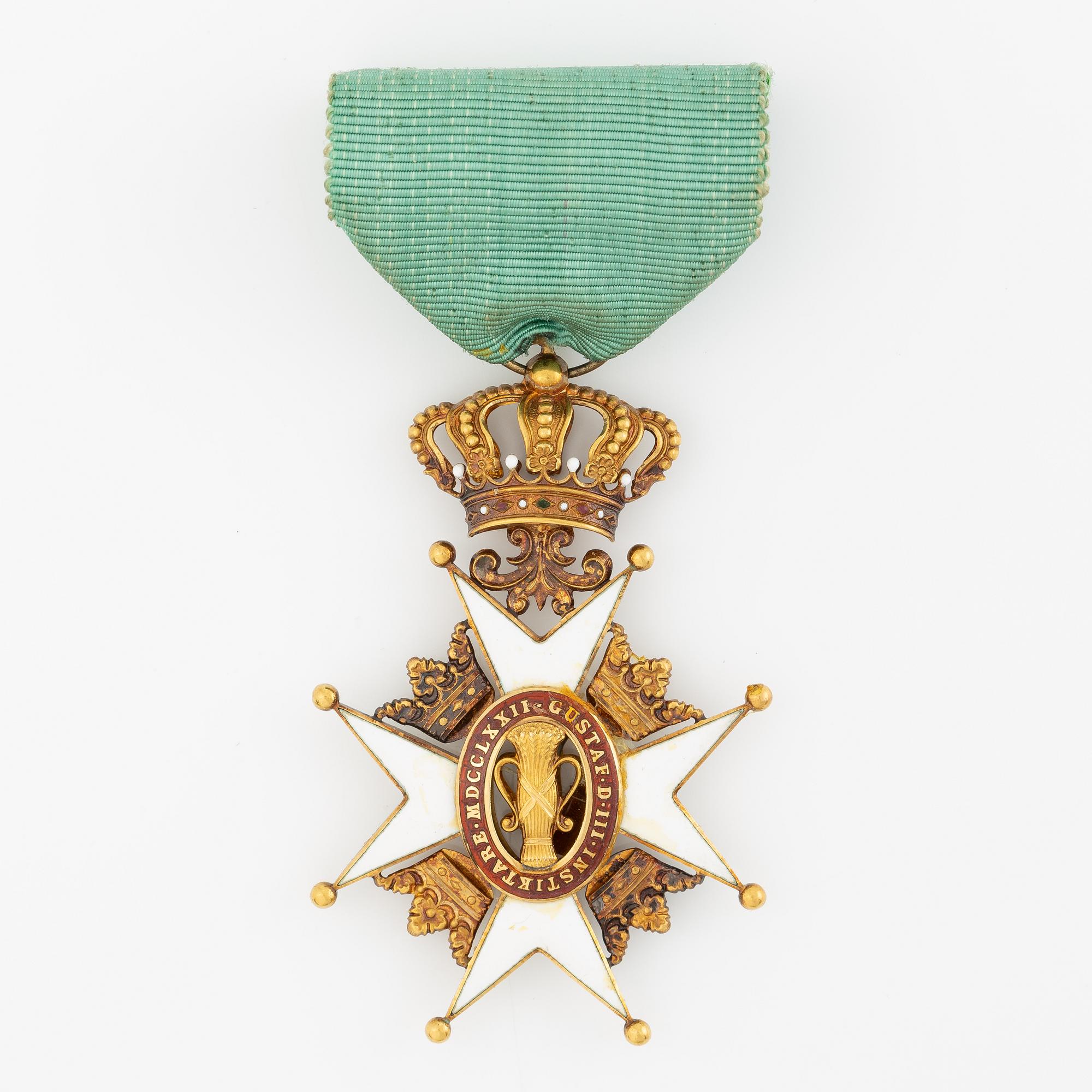 The Order of Vasa, knight's insignia, 18K gold and enamel, C.F. Carlman, in case.