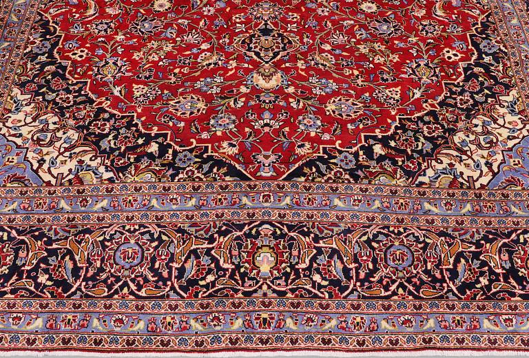 A Keshan carpet, 390 x 297 cm.