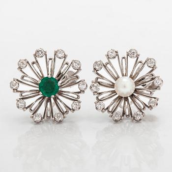 Tillander, a pair of flower earrings in platinum/palladium with octagon-cut diamonds, cultured pearls and emeralds.