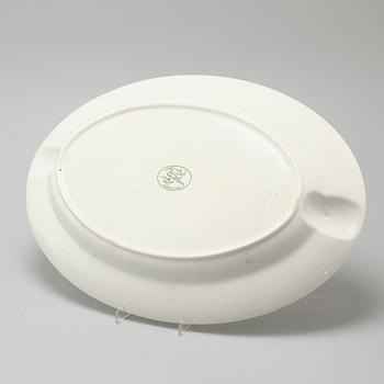 A 20th century set of earthenware tableware of 21 pcs by Gustavsberg.