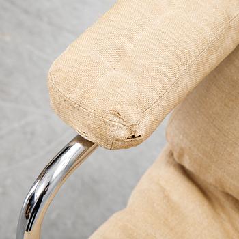 Bruno Mathsson, a pair of easy chairs and a coffee table, 'Karin', Dux, second half of the 20th Century.