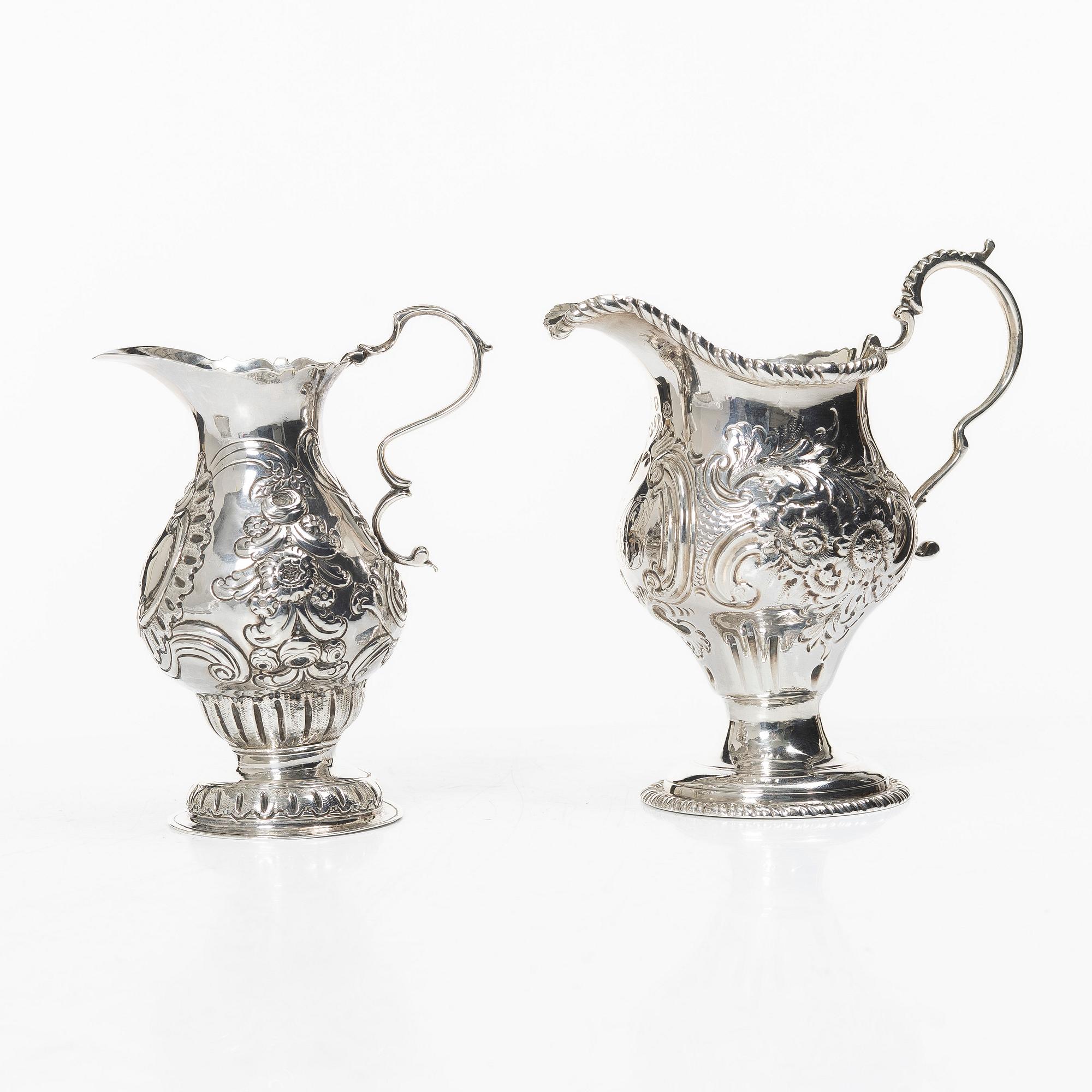 Two creamers, a tray, and a sugar tongs, silver, Rococo and Rococo style, 18th-19th century.