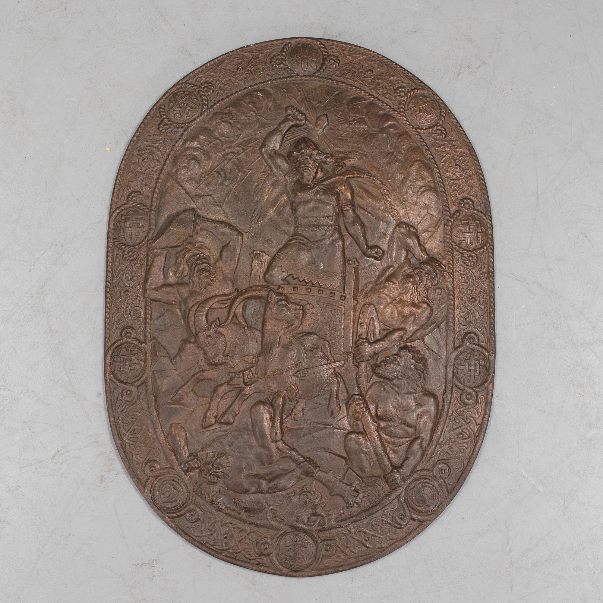 A late 19th century decorative wrought iron shield, Brevens Bruk, 1890.