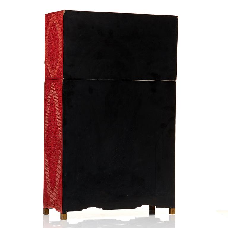 A carved  lacquer 'Kang'Cabinet, Qing dynasty, 18/19th Century.