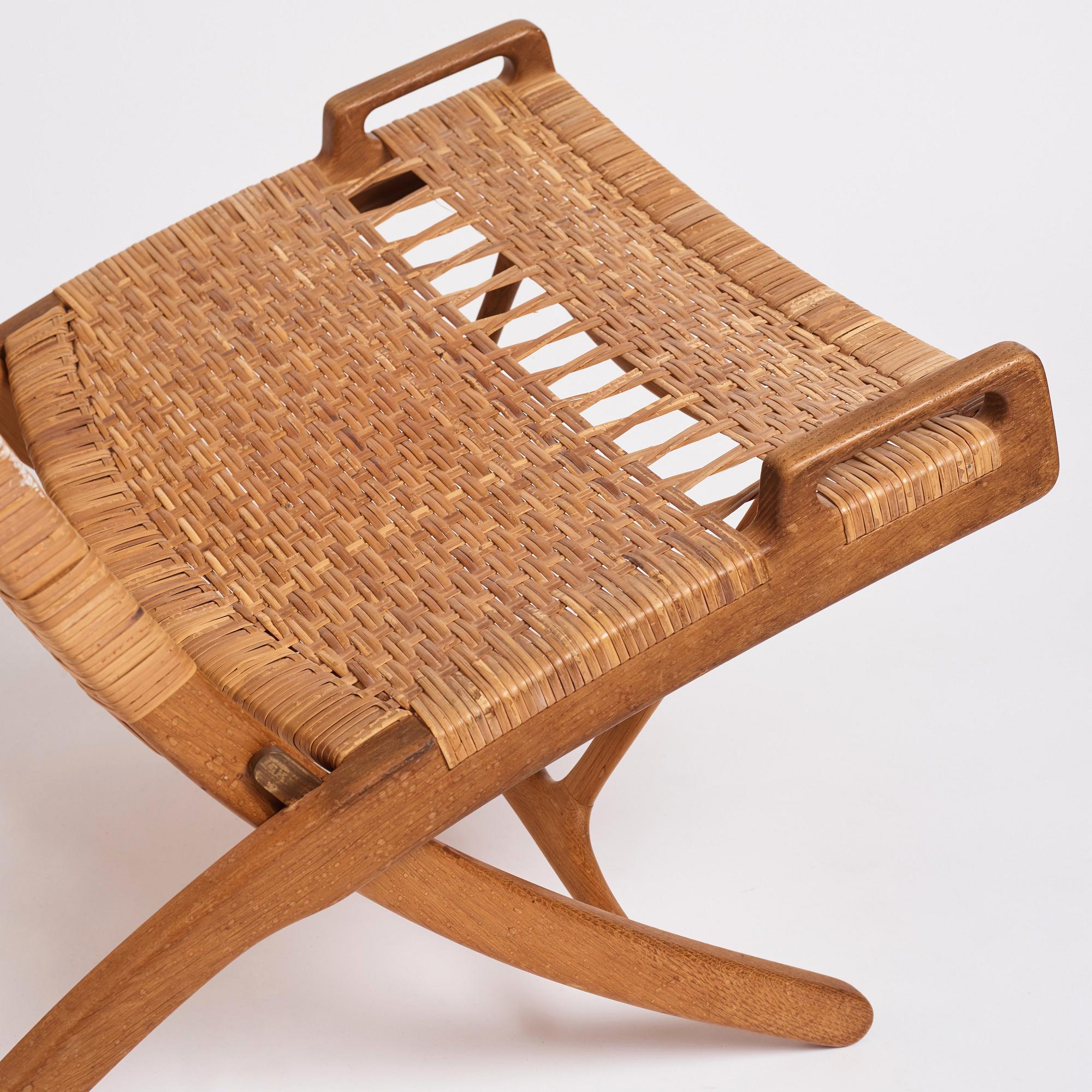 Hans J. Wegner, a pair of oak and rattan folding chairs 'JH-512', Johannes Hansen, Denmark 1950-60s.