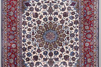 A rug, Esfahan, silk warp and part silk pile, ca 245 x 155 cm.