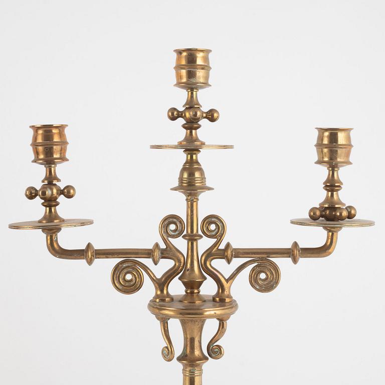 A pair of brass candelabra, Gusums Bruk, circa 1900.