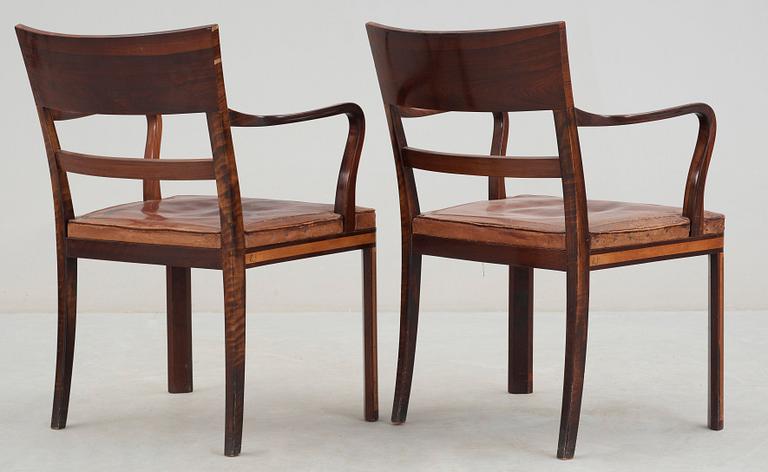 A pair of cabinetmaker Edvin Johansson palisander and stained birch armchairs, Stockholm 1932.