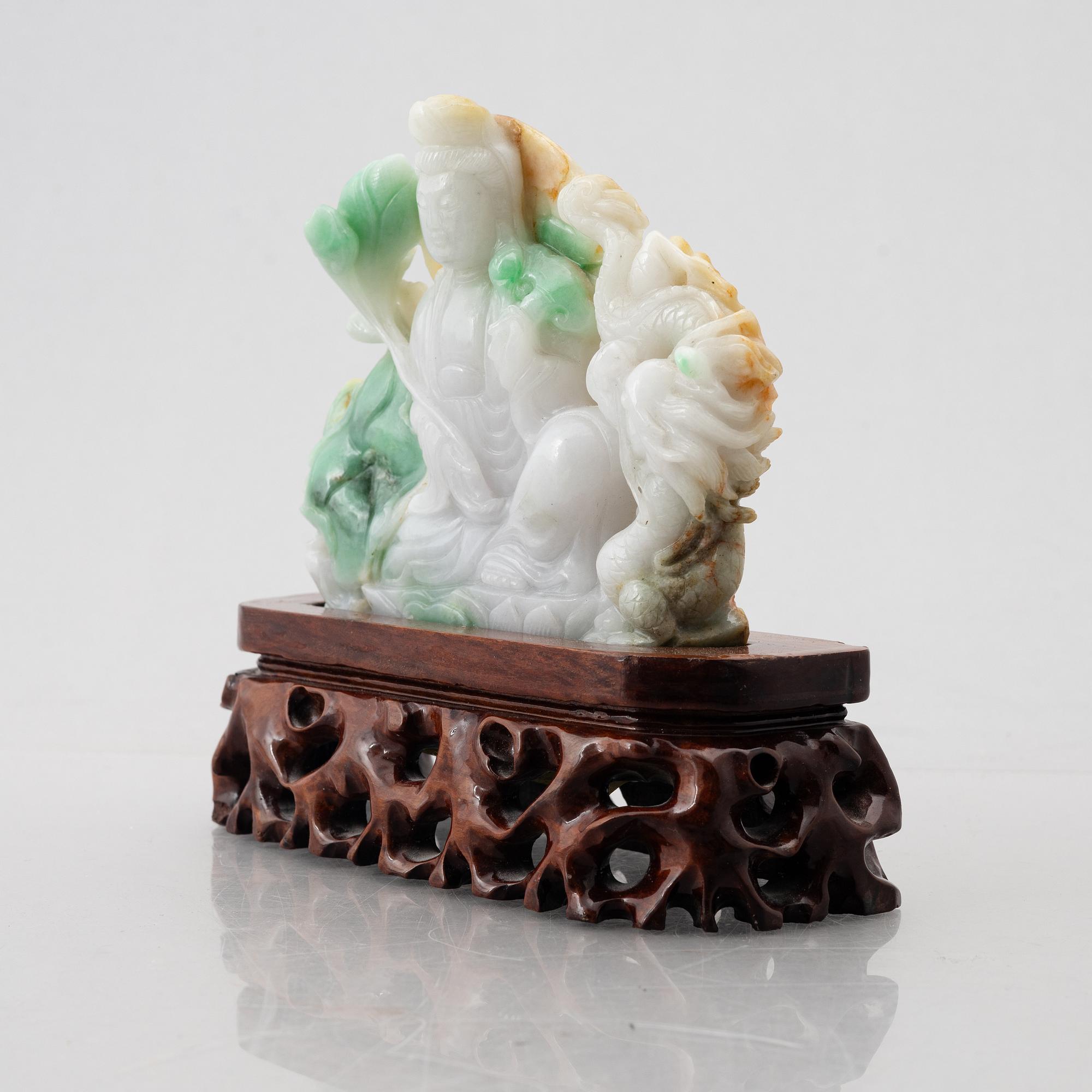 A Chinese stone figure of a Guanyin, later part of the 20th century.