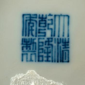 A pair of blue and white dishes, Qing dynasty (1644-1912), with Qianlong seal mark.