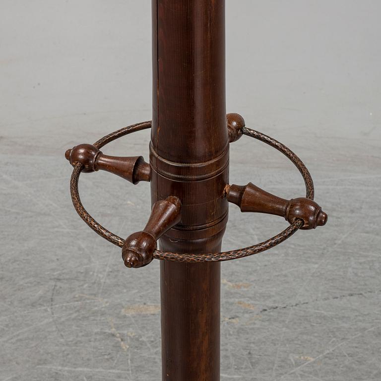 A stained pine clothes hanger, first half of the 20th century.