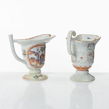 A group of three Chinese famille rose porcelain ewers and two dishes, Qing dynasty, Qianlong (1736-95).