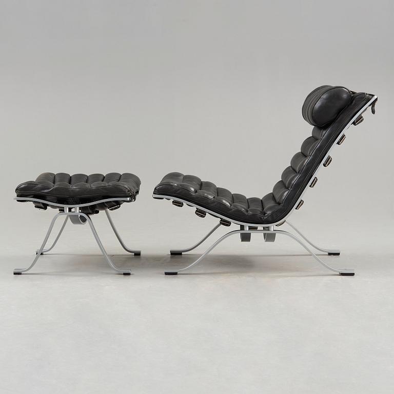 Arne Norell, an 'Ari' steel and black leather lounge chair with ottoman, Norell, Sweden.