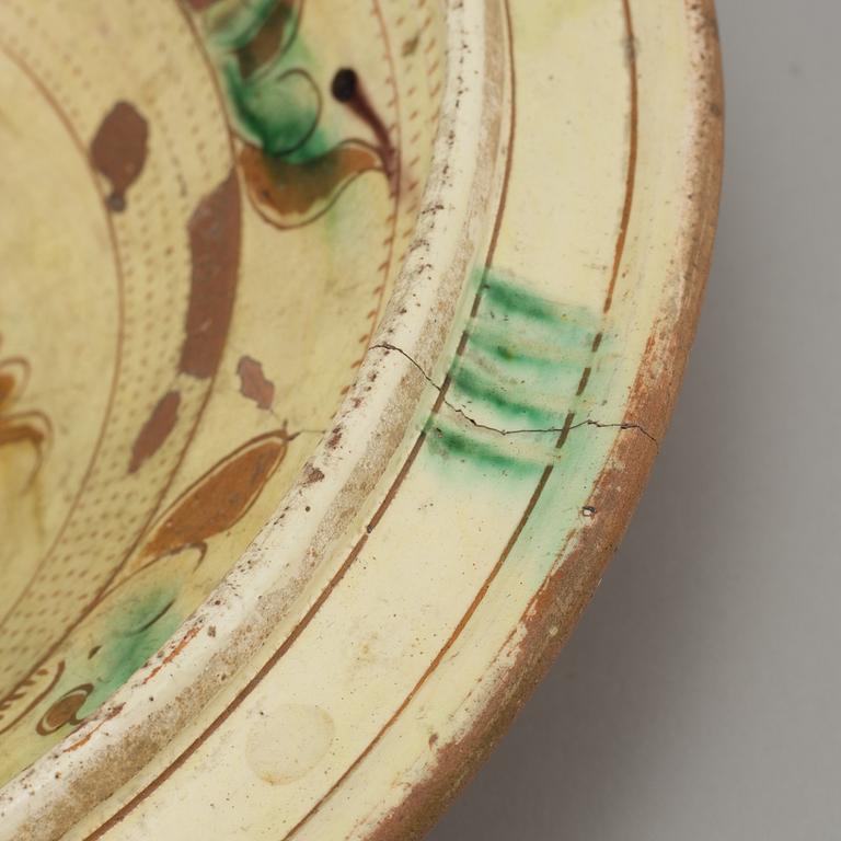 a earthenware plate dated 1782.