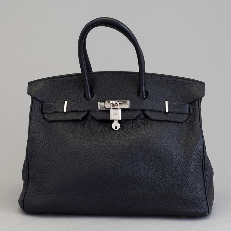 A dark blue togo "Birkin 35" bag by HermÈs from 2009.