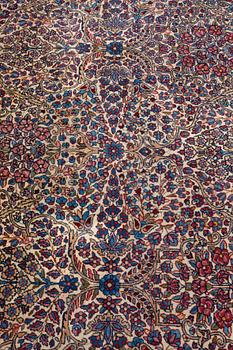 A CARPET, semi-antique, Kerman, ca 362,5 x 265 cm.