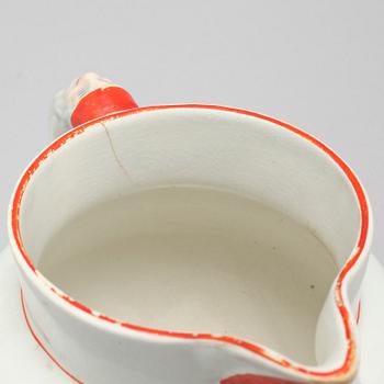 An eartheware porrige tureen and a jug from Göteborg, around the year 1900.