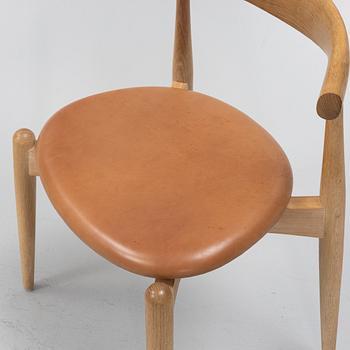 Hans J. Wegner, four oak 'model CH 20' chairs from Carl Hansen & Søn, Denmark.