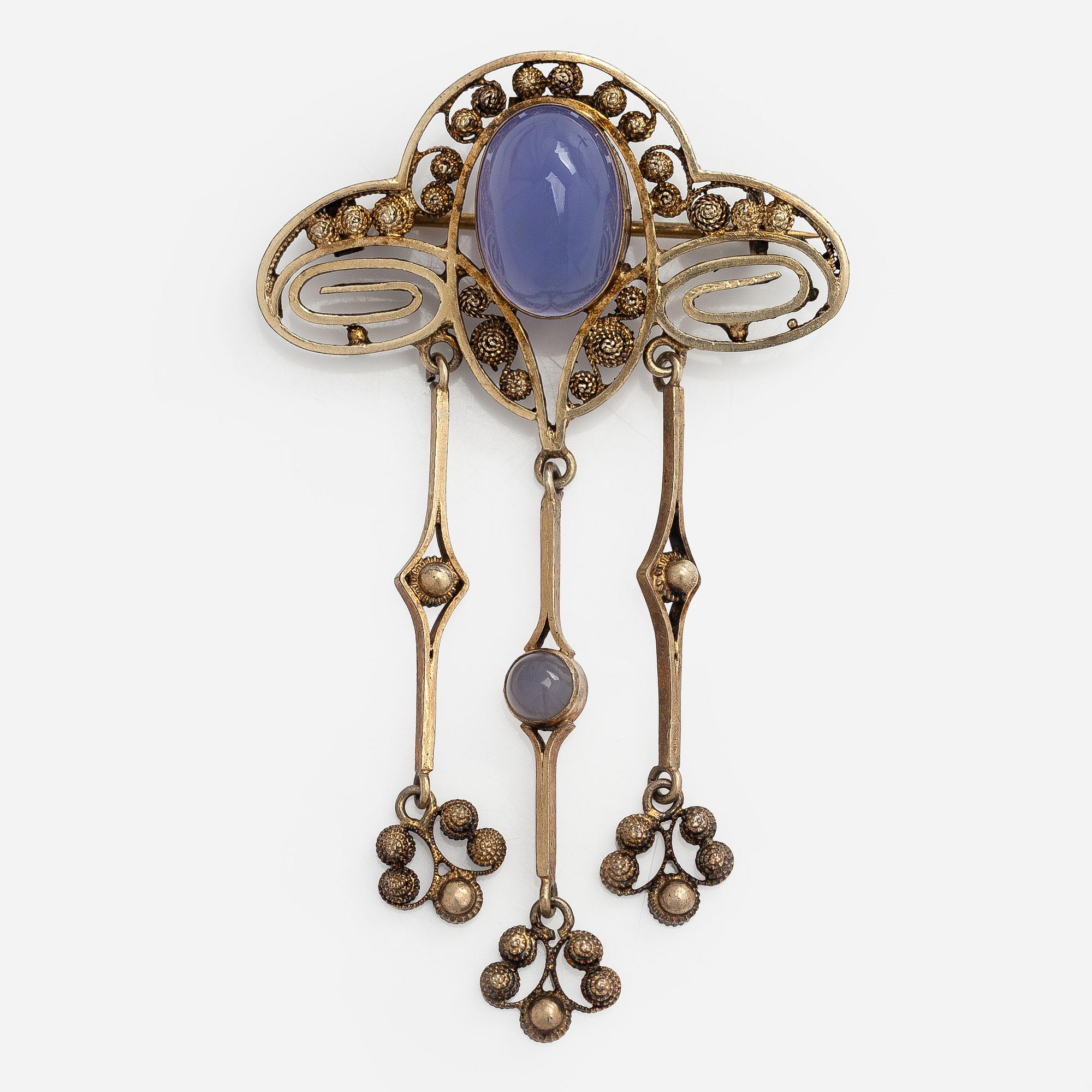 Brooch, cabochon-cut moonstones, gilded silver.