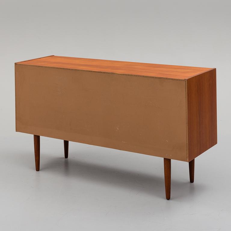 A 'Lyon' teak veneered sideboard designed by Nils Jonsson, Hugo Troeds Bjärnum, Sweden.