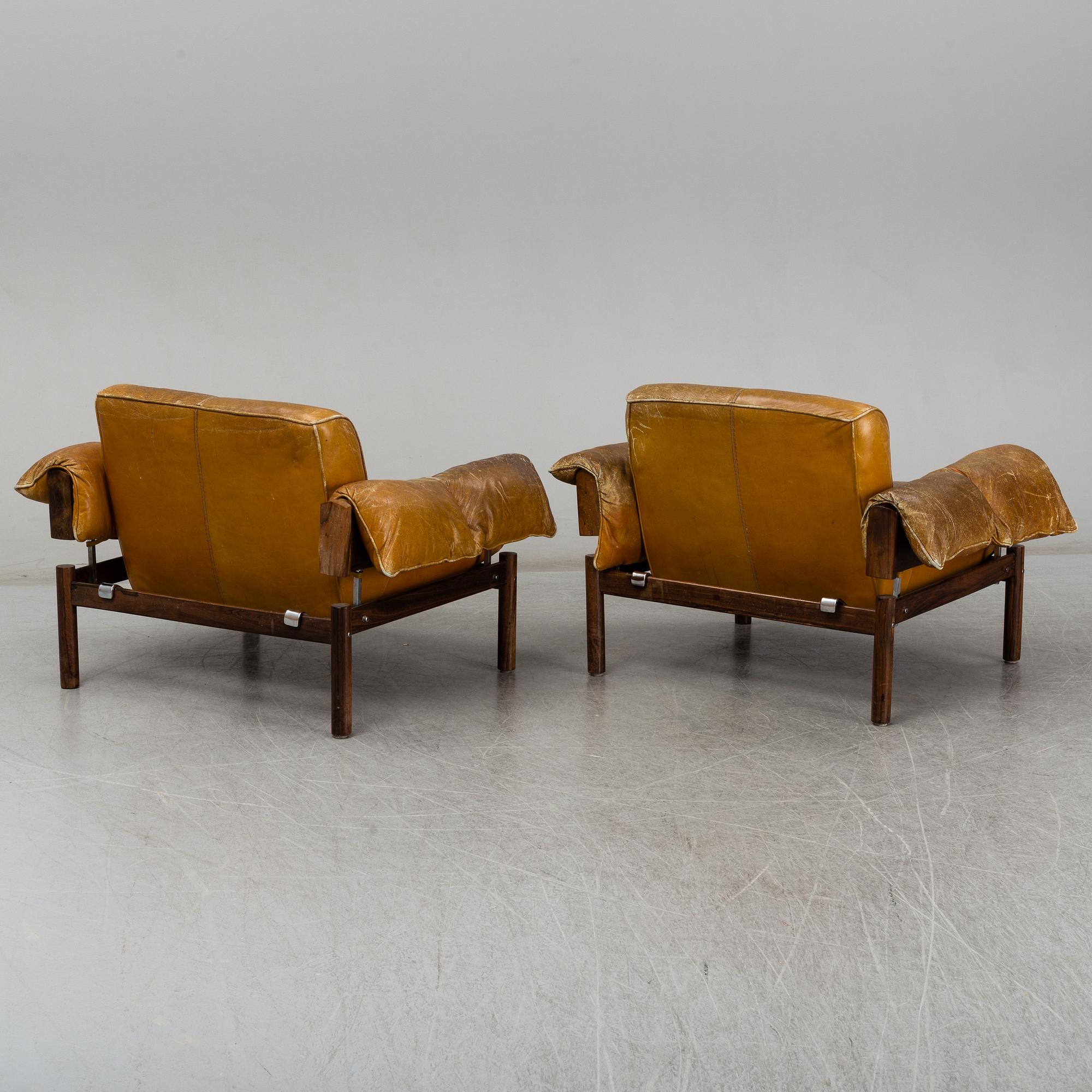 PERCIVAL LAFER, a pair of leather and rosewood easy chairs, MP Lafer, Brasil, 1960/70s.