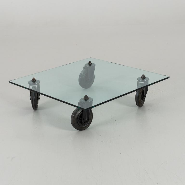 A "TAVOLO CON RUOTE" SOFA TABLE, Fontana Arte, signed.