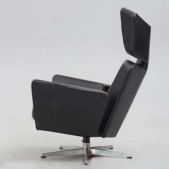 Arne Jacobsen, a black leather and aluminium "Ox-Chair", Denmark 1966.