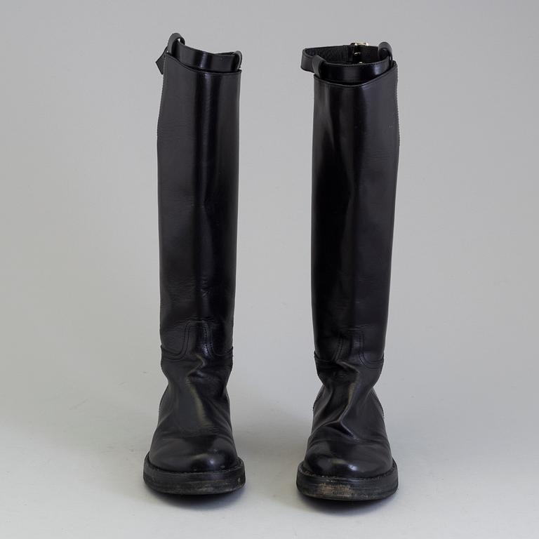 a pair of Ann Demeulemeester, "Vitello Lucido Nero Riding Boots". Size 38.