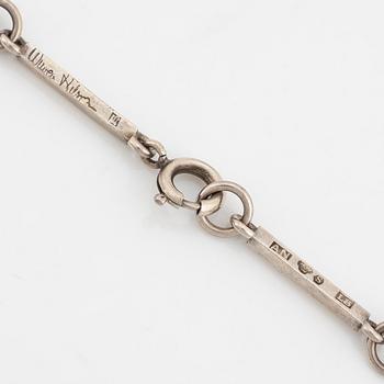 Wiwen Nilsson, hängsmycke, silver med fasettslipad bergkristall, Lund, 1937.