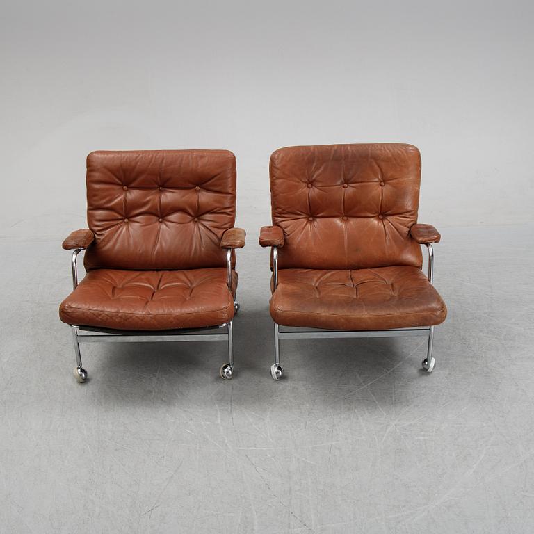 A pair of 'Karin' easy chairs by Bruno Mathsson for Dux, designed 1969.